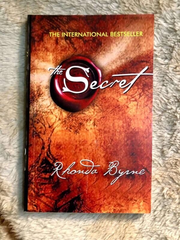 The Secret by Rhonda Byrne about the law of attraction and manifesting success